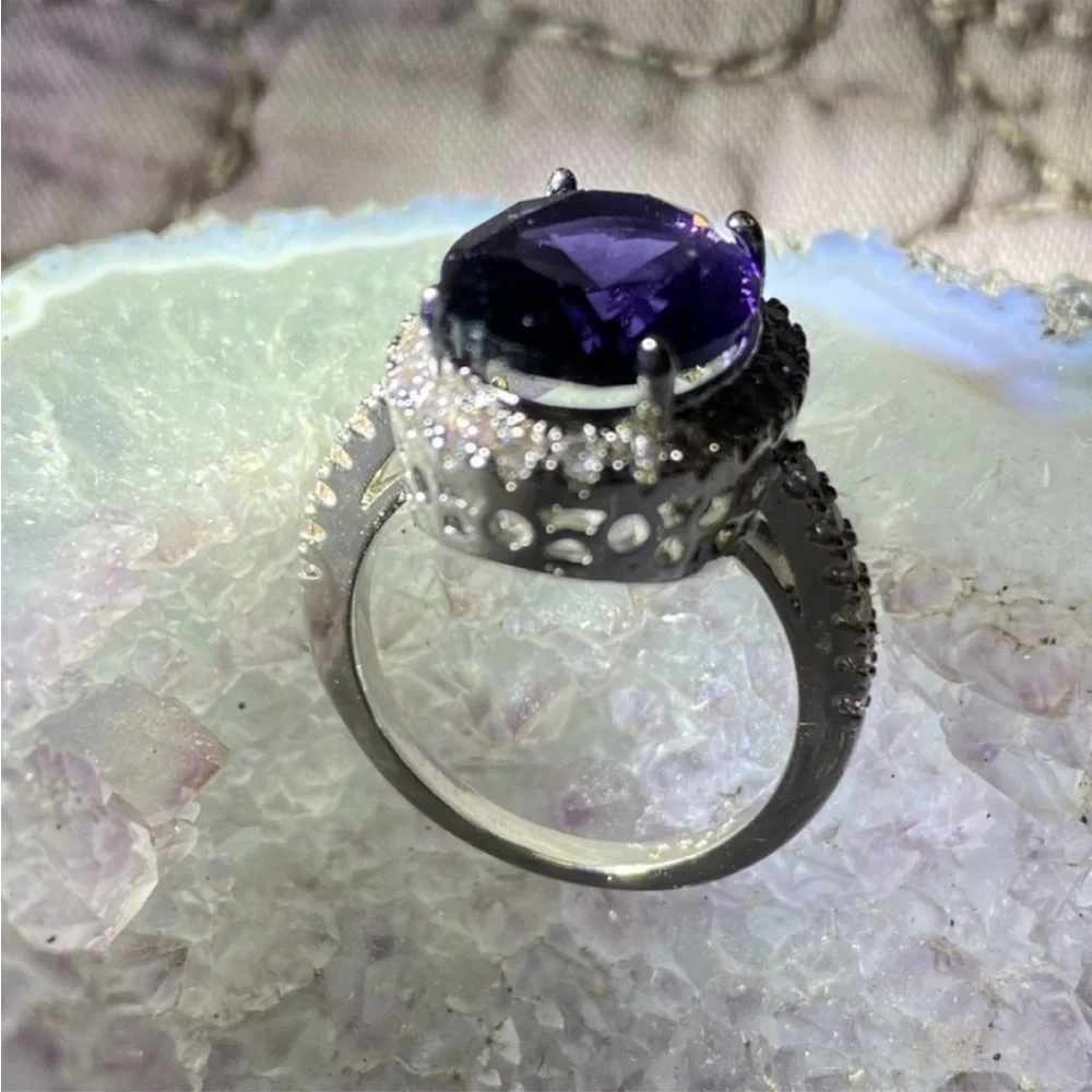 Sterling Silver amethyst prong set cocktail ring with gemstone halo bezel